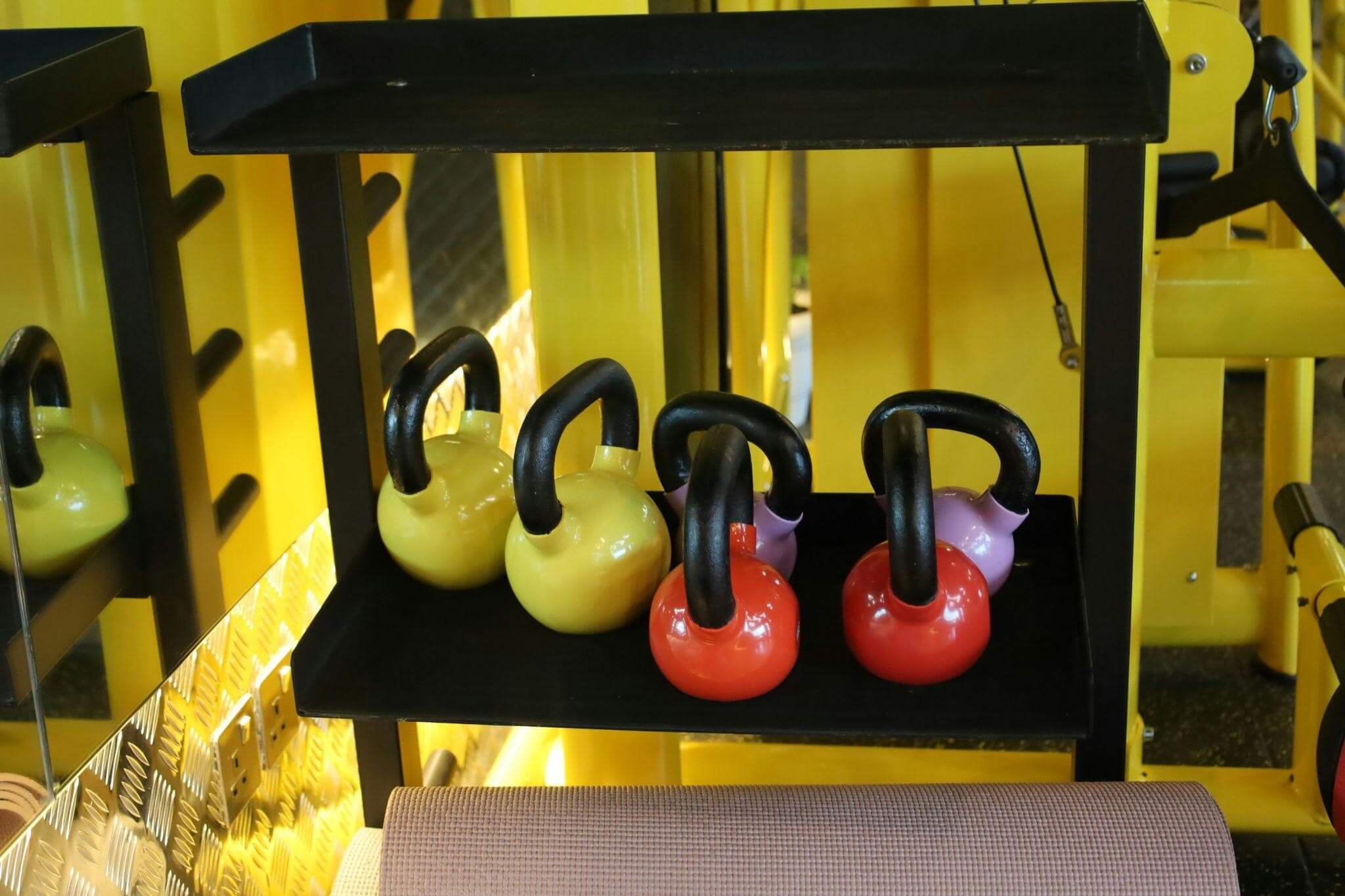 Fitness equipment replica for kids at a gym with childcare